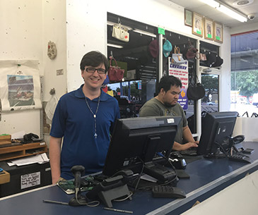 Joshua and Howard working the counter